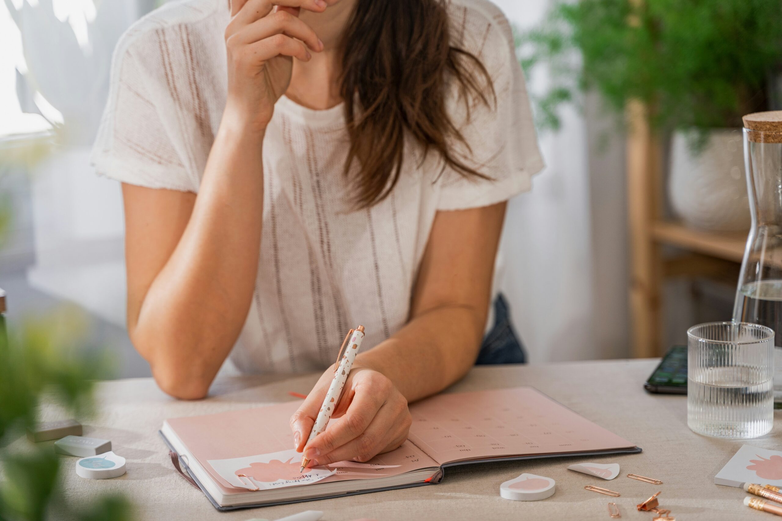 A couple looking stressed while reviewing bills.