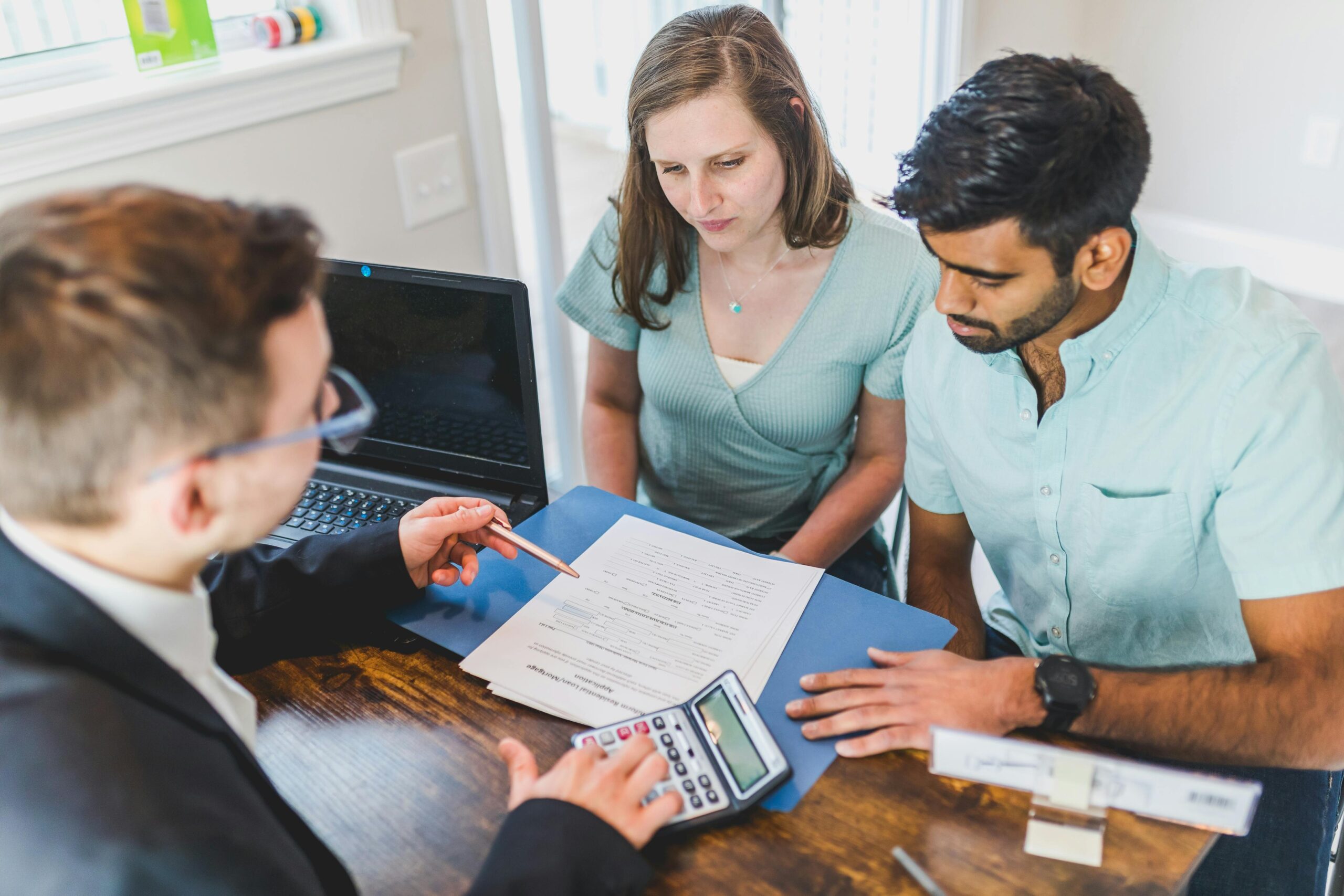 Couple discussing joint credit card issues at home