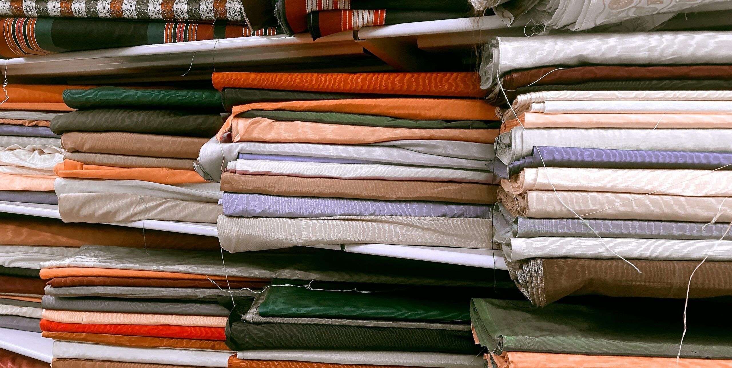 Illustration showing messy stacks of documents representing traditional application processes