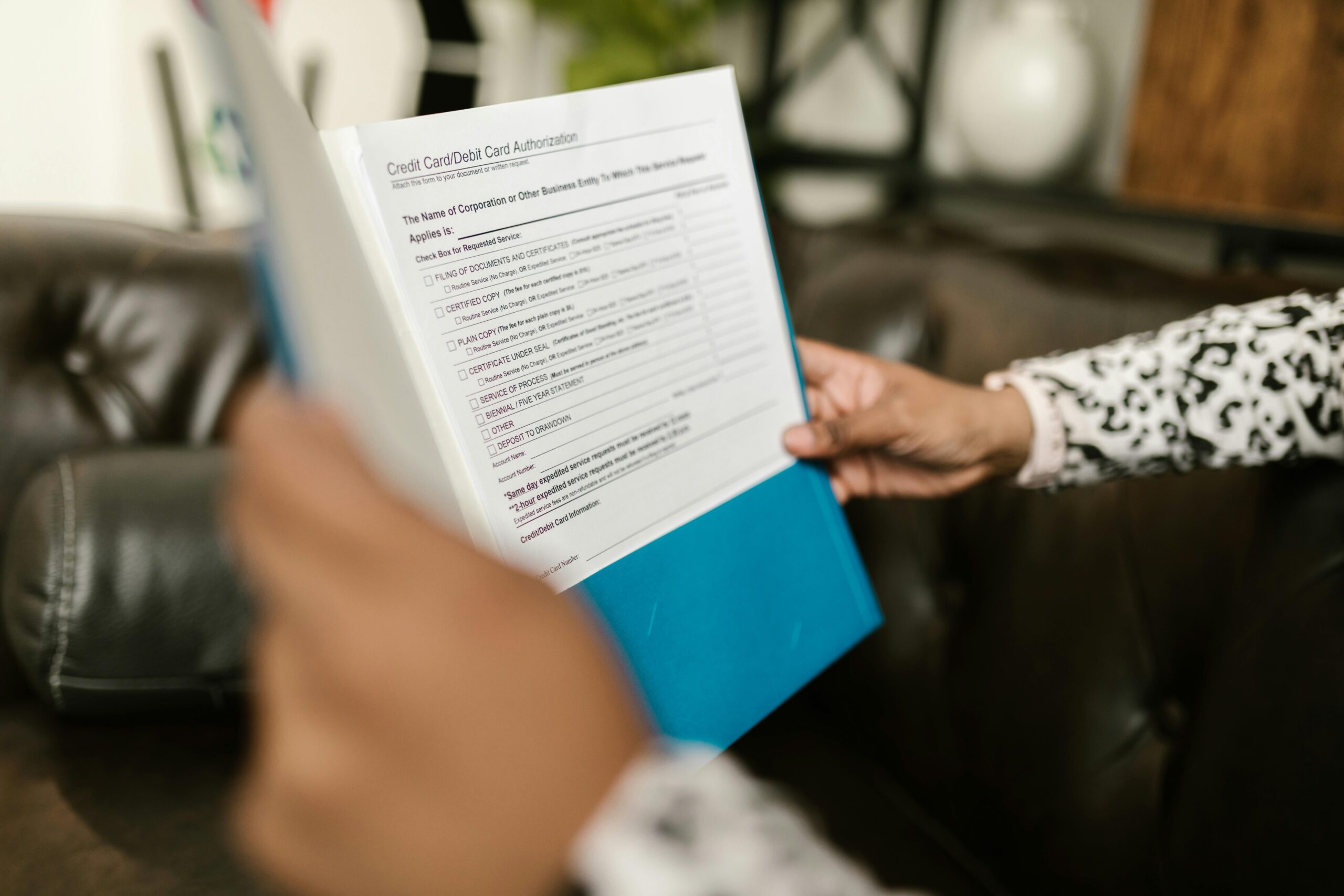 People reviewing a financial agreement document