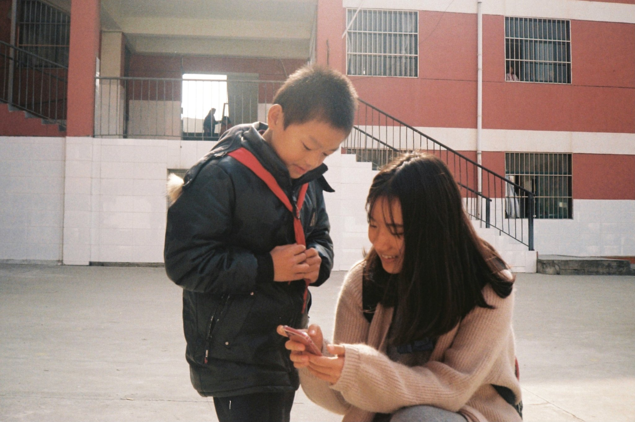 A frustrated couple looking at a denied credit card application letter.